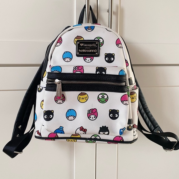 Loungefly Handbags - Loungefly Loves Hello Sanrio Mini Backpack 2017 Release